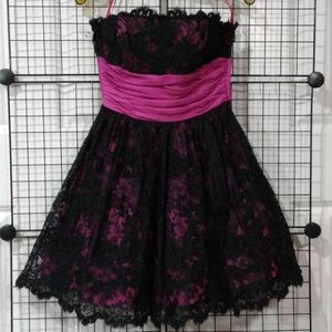 Rare cocktail dress w petticoat, bow on back .NWOT